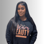 Woman in a hoodie with "Glam Beauty" text.